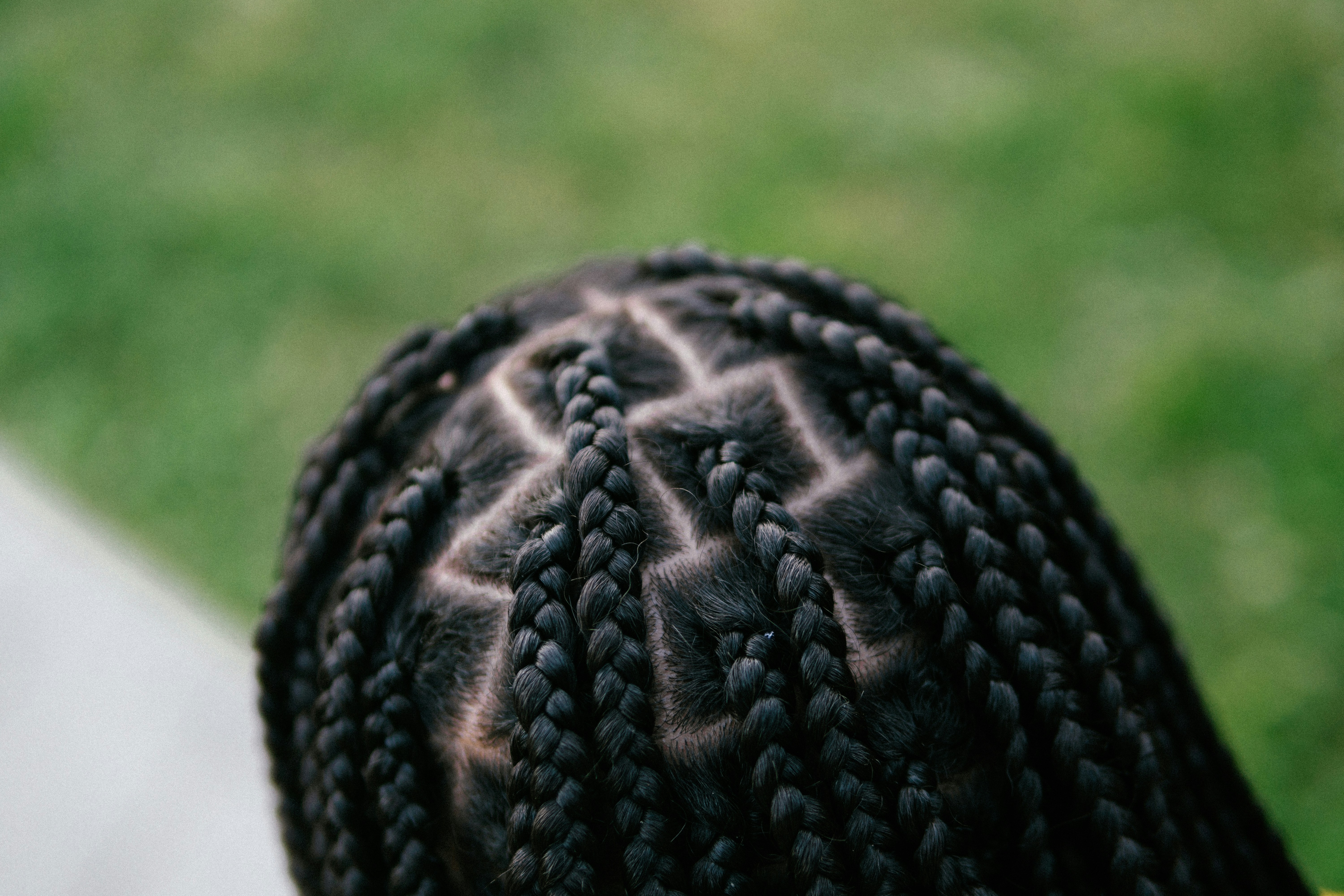 Precise cornrow braiding detail
